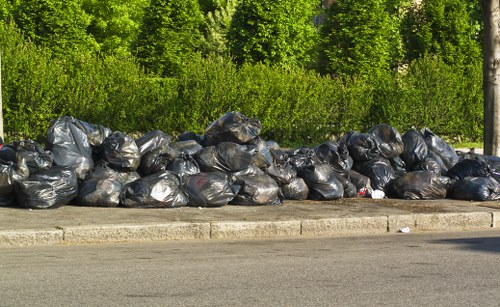 Recycling bins and waste materials in an Osterley business